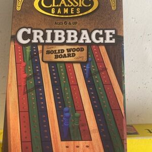 Two cribbage game new in box and one Ridley’s Ding it game new in box